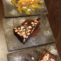 Mango cheesecake, Nutella cake and snickers tart at Kong - Food Made With Compassion in Lisbon