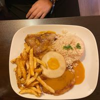 Seitan steak with rice and fries and vegan egg at Kong - Food Made With Compassion in Lisbon