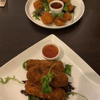 Cauliflower wings up top & sausage croquettes in the bottom  at Kong - Food Made With Compassion in Lisbon