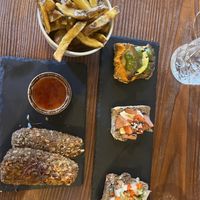 Croquettes, mixed bruschetta and some fries   at Kong - Food Made With Compassion in Lisbon