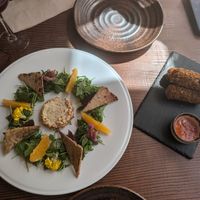 Homemade cheese (L) and Chorizo croquettes (R) at Kong - Food Made With Compassion in Lisbon