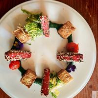 Mediterranean "salmon" with tofu, sesame, spinach and au gratin potatoes. A plate with an impressive circular presentation and an excellent taste of vegetable salmon! at Kong - Food Made With Compassion in Lisbon