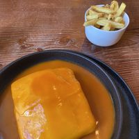 francesinha and friesnds  at Kong - Food Made With Compassion in Lisbon
