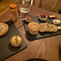Pastel de nata com gelato (left) and cheese board (right). at Kong - Food Made With Compassion in Lisbon