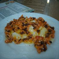 Rice steamed cake with tofu topping at Bo De in Hue