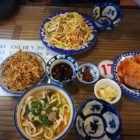Vegan udon noodle soup, fried jackfruit with sesame, fried noodles and tofu with tomato sauce at Lien Hoa in Hue