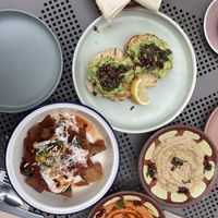 Avocado bagel, capsicum and hummus dip, Fattet Makdous   at Khamsa in Erskineville