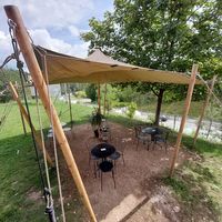 Outside seating area at Tavci Kuhna in Lesce