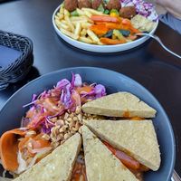 Falafel plate and Asian bowl. at Tavci Kuhna in Lesce