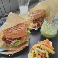 Vegan burger with roasted vegetables and chicken sandwich at Tavci Kuhna in Lesce