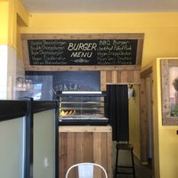 Burger menu board - July 2022  at The Pizza Castle and Indian Curry in Vancouver