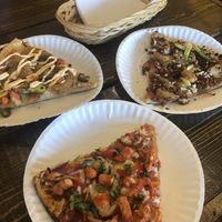 Onion ring (top left); meat/potato (top right); butter chicken   at The Pizza Castle and Indian Curry in Vancouver