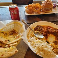 Curry buffet with fresh naan and "chicken" burger at The Pizza Castle and Indian Curry in Vancouver