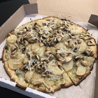 Vegan mushroom potato pizza at The Pizza Castle and Indian Curry in Vancouver