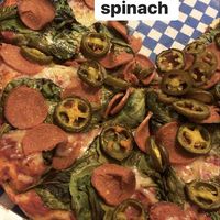 Pepperoni + jalapeños + baby spinach 😍 at The Pizza Castle and Indian Curry in Vancouver