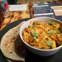 Tofu curry and chapati at Supplant Foods  in North London