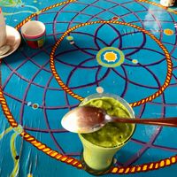 One the fantastic vegan smoothies made of avocados, dates, banana and spinach topped with pomegranate seeds and and chai seeds. Brilliant.  at Mandala Cafe in Agonda