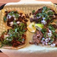 4 different street tacos- chorizo, al Pastor, asada, and carnitas.  All delicious! at Just Vegana in Fontana