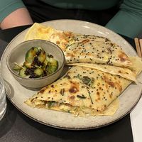 Jianbing with shiitake and tofu w/ cucumber salad on the side (the chili oil was added)   at Lao Lao in Stockholm