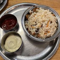 Mushrooms onions and fried rice dish  at Saravanaa Bhavan - Sankt Eriksgatan in Stockholm
