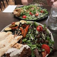 The Stromboli (back) and a veg, meatball, focaccia and salad plate (front)  at Utopia in Nice
