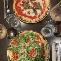 Diavola (top) and primavera (bottom) pizzas  at Utopia in Nice