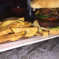 Vegan burger with fries at La Morena in Taganga