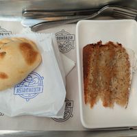 Empanada de cebola caramelizada e bolo de banana com doce de leite at Astronauta in Sao Paulo
