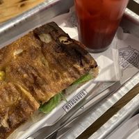 Chá gelado e focaccia recheada  at Astronauta in Sao Paulo