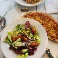 Glutenfree pizza - lighter version means half a pizza plus a salad  at Bella Italia in York