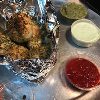 Garlic knots with ranch, pesto, and marinara  at Sizzle Pie in Reno