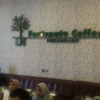 Inside the logo at LN Fortunate Coffee in Pekanbaru