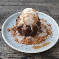 Warm pudding with ice cream at The Roundhill in Brighton