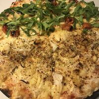 You can do half and half for 20€ to try two different vegan pizzas! 🍕 at Pizza Posta in Madrid