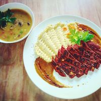 Seitan steak s hrachovovou kaší a cibulovo-pivní omáčkou, polévka krémová se zeleninou, žampiony a s rýží at Bubu's Pub & Kitchen in Prague
