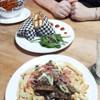 Tofu Wrap, Poutine and Sweet Potato Fries at Bubu's Pub & Kitchen in Prague