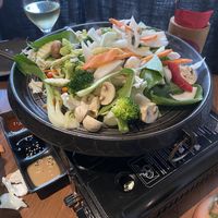 Bapsang BBQ for two people: Stage 1 – add the vegetables  at Feel Seoul Good in Berlin