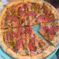 Vegan Pizza with Tomatoes and garlic basilicum sauce at Happiz - Monge in Paris