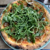 Medium Pizza: Tomato Sauce, Vegan Cheese, Roquette, Champignons, Onions, Vegan Salami, Garlic Oil  at Happiz - Monge in Paris