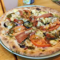 Vegan pizza with eggplant, yams, vegan mozzarella, and vegan bacon at Happiz - Monge in Paris