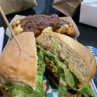 Balvin Burger with loaded tater tots  at Vegan Junkie - Tavern Flower Food Truck in Fort Lauderdale