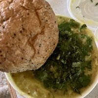 This is the Kitcheree w their yummy roll on the side. Absolute comfort food.   at Dharma's in Capitola