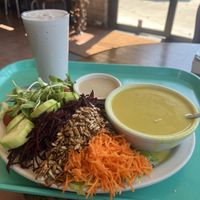 Gardener’s Salad, Lemon Tahini Dressing, Malaysian Corn Chowder, and Raspberry Shake  at Dharma's in Capitola