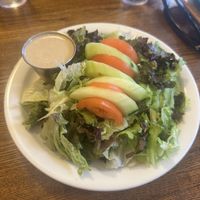 Side salad with vegan tahini lemon dressingg  at Dharma's in Capitola
