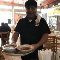 Sergio, the owner, serving some nice tastes at Panchos & Gringos Deli in San Antonio