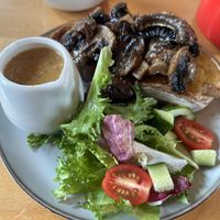 Mushrooms on sourdough with oat cream garlic saucee made  at Spider on a Bicycle in Aboyne