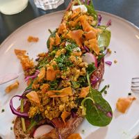 Bread with vegan scrambled eggs and pesto rosso at Plain in Vienna