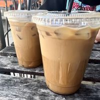 Two iced coffees with oat milk on the deck area  at Kaibur Coffee in Pittsburgh