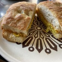 Great breakfast sandwich with vegan egg and cheese .  at Kaibur Coffee in Pittsburgh