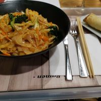 Vegan rice noodles with veggies and tofu. And a veggie springroll at Sugoi Ramen in Bilbao